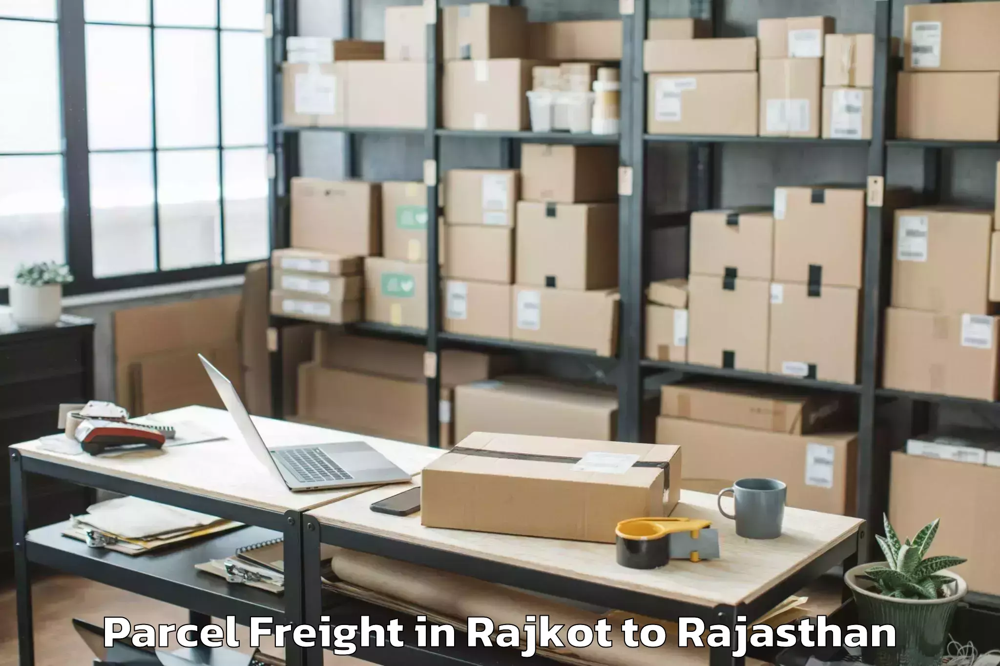 Book Rajkot to Sardarshahr Parcel Freight